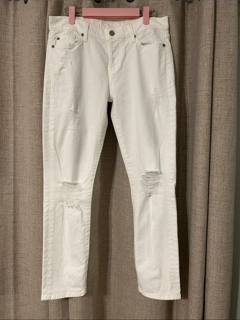 7 For All Mankind White Slim Straight Distressed Jeans.
